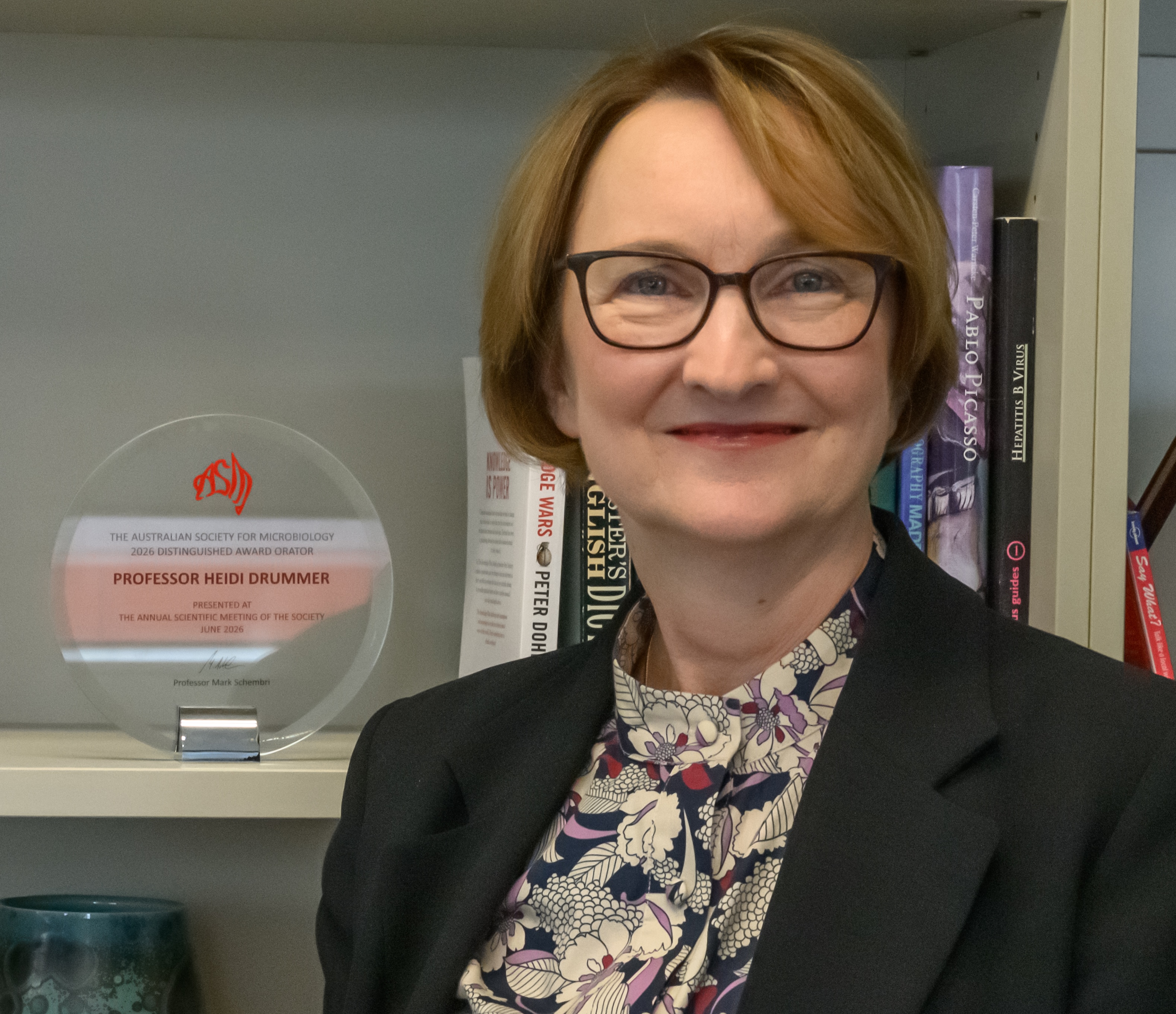 Professor Heidi Drummer with her trophy.