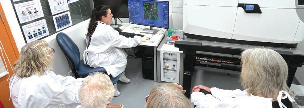 Dr Betty Kouskousis demonstrating the advantages of the latest microscopy technology.
