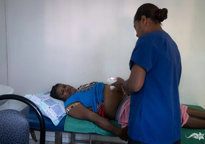 DSCF7070 Nurse Consultation With Pregnant Person And Health Worker At Vanuatu Family Health Association (VFHA)